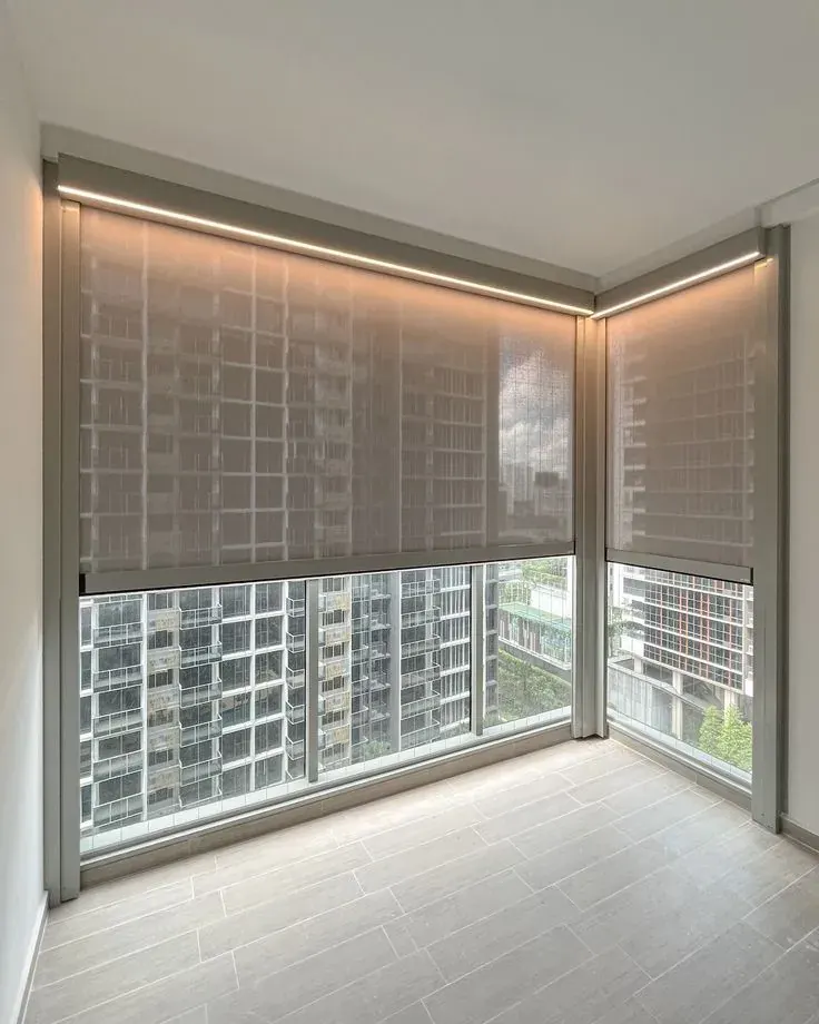 Motorized roller shades on tall New Palestine windows